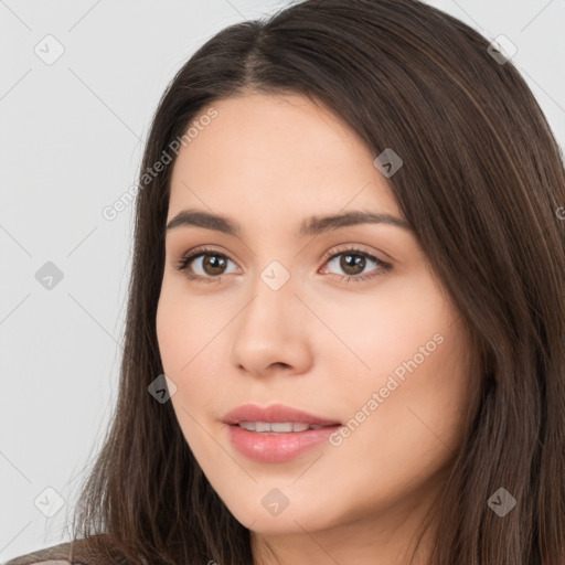 Neutral white young-adult female with long  brown hair and brown eyes