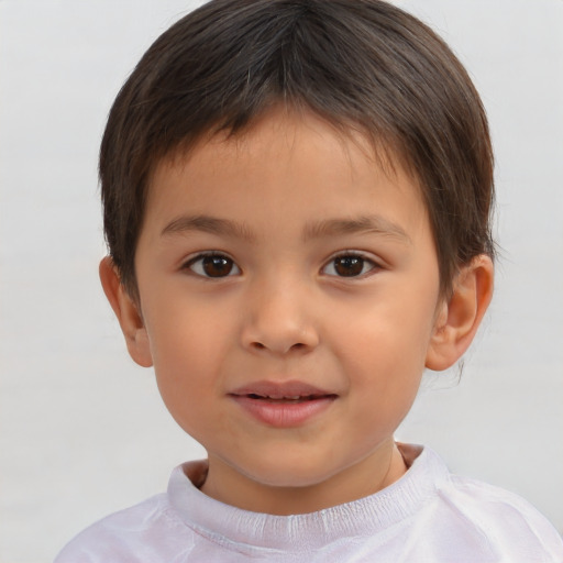 Joyful white child male with short  brown hair and brown eyes