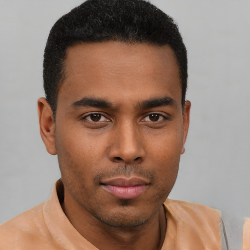 Neutral black young-adult male with short  black hair and brown eyes