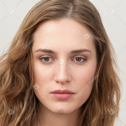 Neutral white young-adult female with long  brown hair and brown eyes