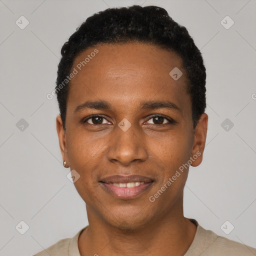 Joyful black young-adult male with short  black hair and brown eyes