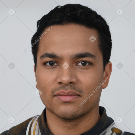 Neutral latino young-adult male with short  black hair and brown eyes