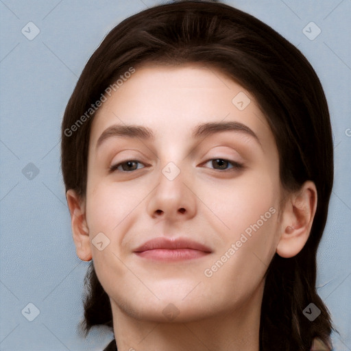 Neutral white young-adult female with long  brown hair and brown eyes