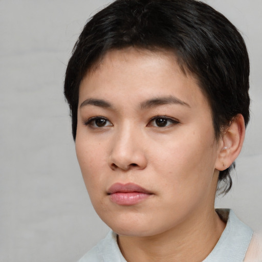 Neutral white young-adult female with short  brown hair and brown eyes