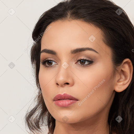 Neutral white young-adult female with long  brown hair and brown eyes