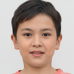 Joyful white child female with short  brown hair and brown eyes