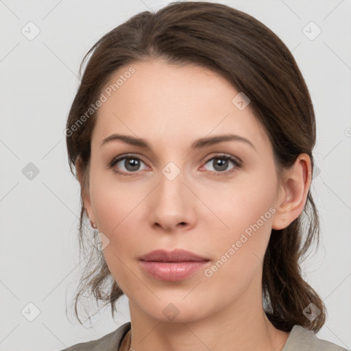 Neutral white young-adult female with medium  brown hair and grey eyes