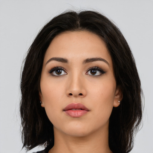 Neutral asian young-adult female with medium  black hair and brown eyes