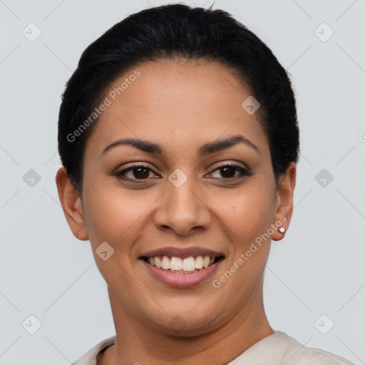 Joyful latino young-adult female with short  brown hair and brown eyes