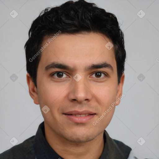 Joyful white young-adult male with short  black hair and brown eyes