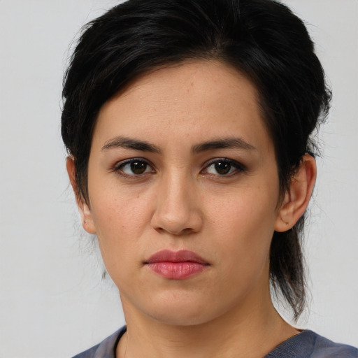 Neutral asian young-adult female with medium  brown hair and brown eyes
