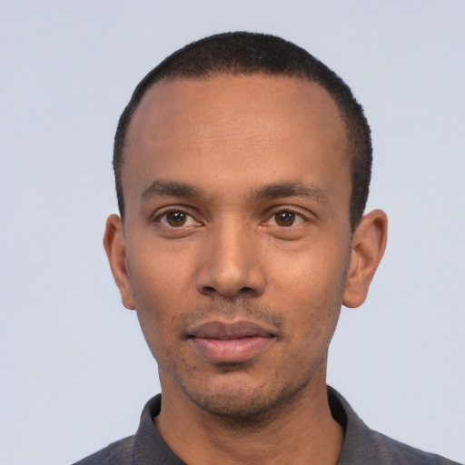 Neutral black young-adult male with short  black hair and brown eyes