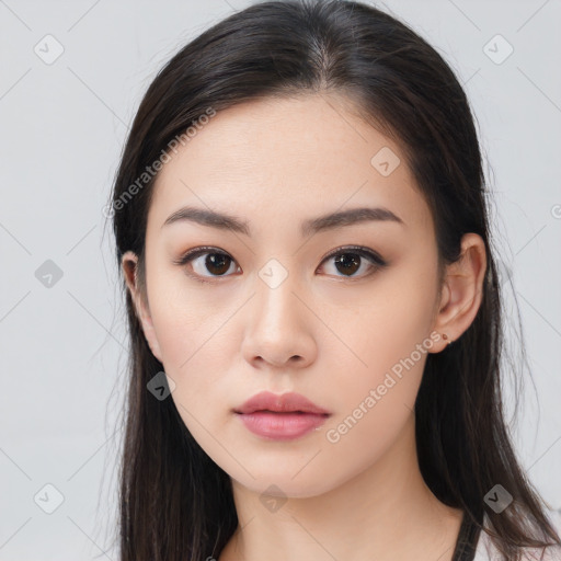 Neutral white young-adult female with long  brown hair and brown eyes