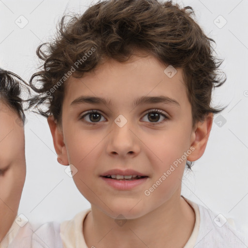 Joyful white child male with short  brown hair and brown eyes