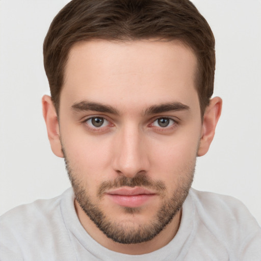 Neutral white young-adult male with short  brown hair and brown eyes