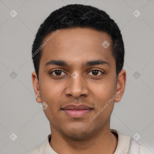 Joyful black young-adult male with short  black hair and brown eyes