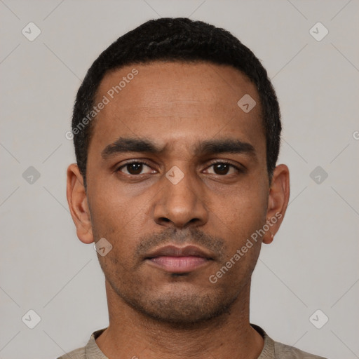 Neutral latino young-adult male with short  black hair and brown eyes