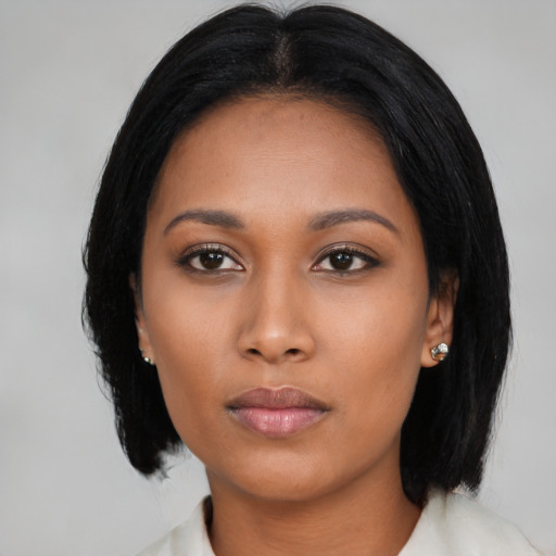 Neutral asian young-adult female with medium  black hair and brown eyes