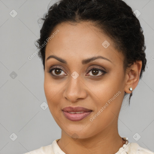 Joyful latino young-adult female with medium  brown hair and brown eyes