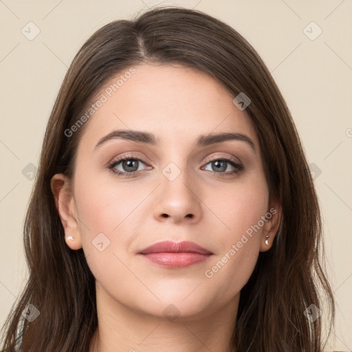 Neutral white young-adult female with long  brown hair and brown eyes