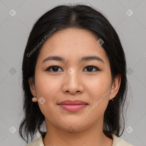 Joyful asian young-adult female with medium  black hair and brown eyes