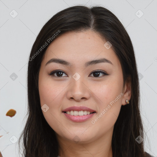 Joyful asian young-adult female with long  brown hair and brown eyes