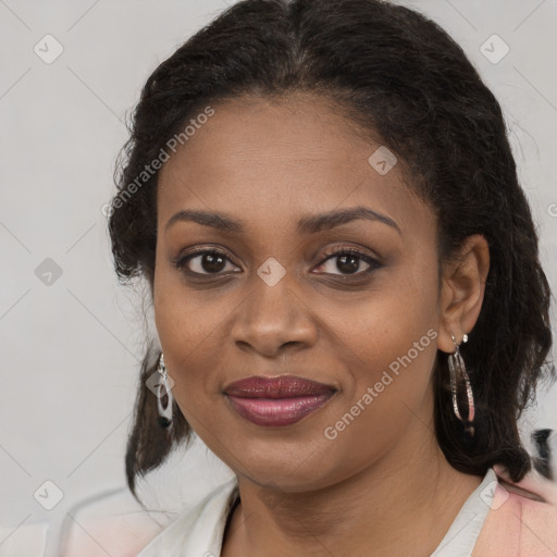 Joyful black young-adult female with medium  brown hair and brown eyes