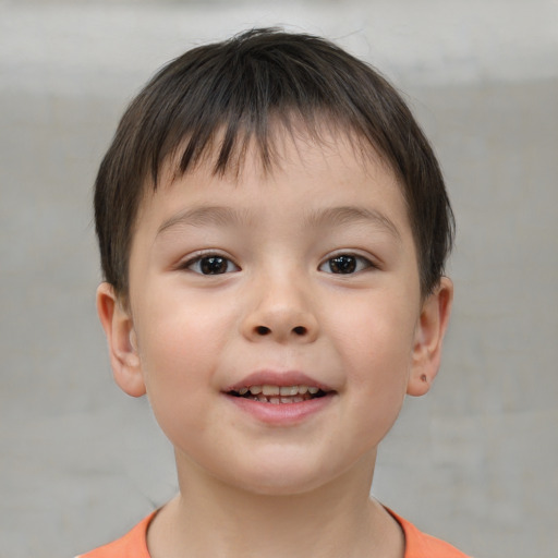 Joyful white child male with short  brown hair and brown eyes