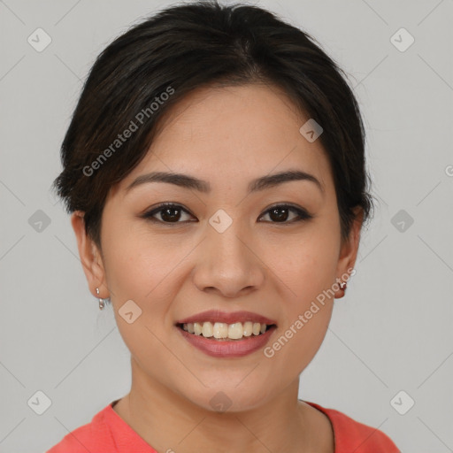 Joyful asian young-adult female with short  brown hair and brown eyes