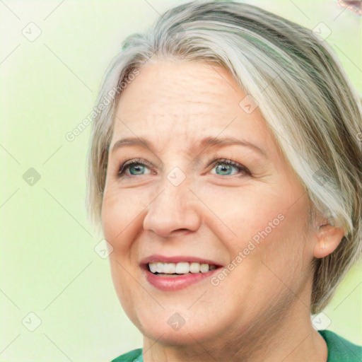 Joyful white adult female with medium  brown hair and green eyes