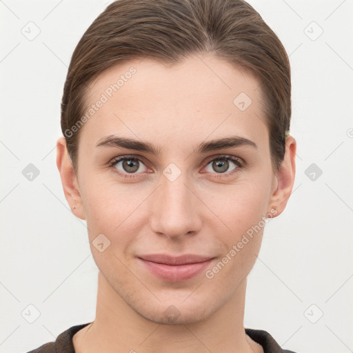 Joyful white young-adult female with short  brown hair and brown eyes