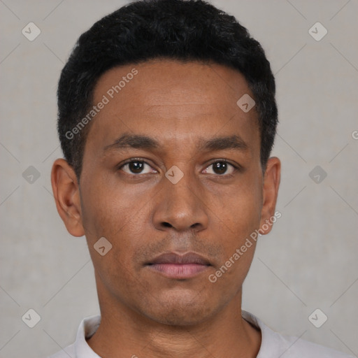 Neutral black young-adult male with short  black hair and brown eyes