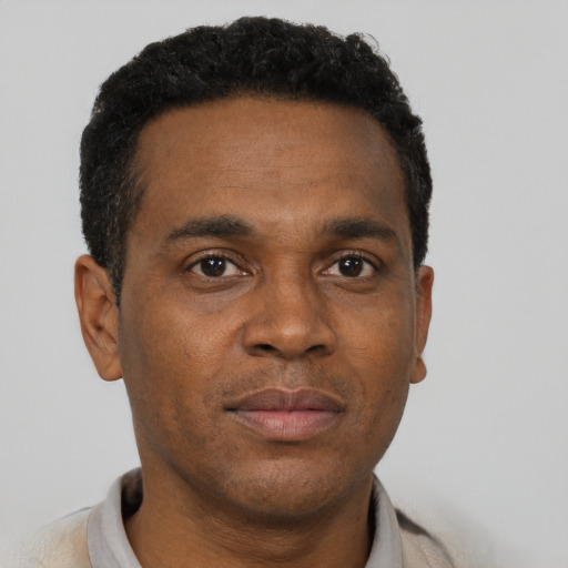 Neutral black young-adult male with short  brown hair and brown eyes
