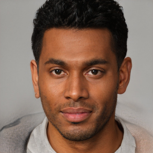 Neutral black young-adult male with short  black hair and brown eyes