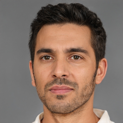Neutral white adult male with short  brown hair and brown eyes