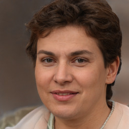 Joyful white adult female with short  brown hair and brown eyes