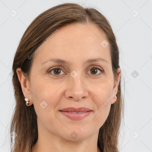 Joyful white adult female with long  brown hair and brown eyes