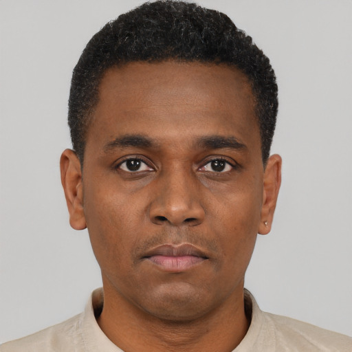 Neutral black young-adult male with short  black hair and brown eyes