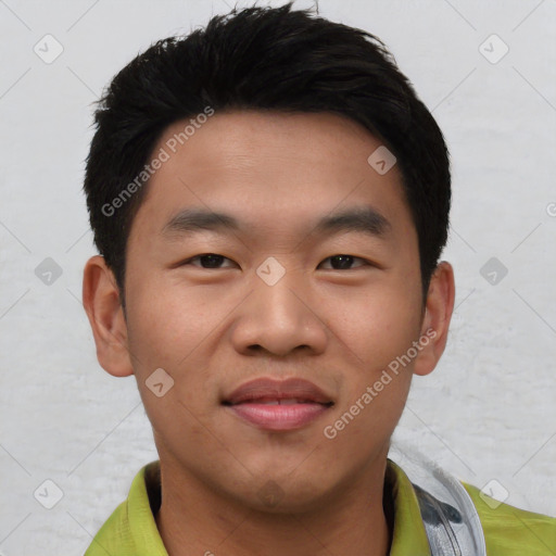 Joyful asian young-adult male with short  black hair and brown eyes