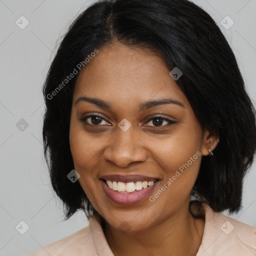 Joyful black young-adult female with medium  brown hair and brown eyes