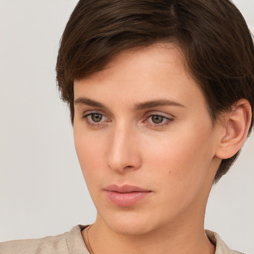 Neutral white young-adult female with short  brown hair and brown eyes