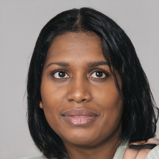 Joyful asian young-adult female with medium  black hair and brown eyes