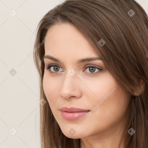 Neutral white young-adult female with long  brown hair and brown eyes