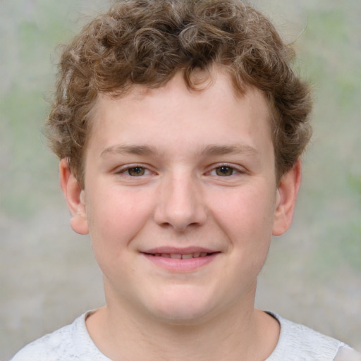 Joyful white child male with short  brown hair and brown eyes