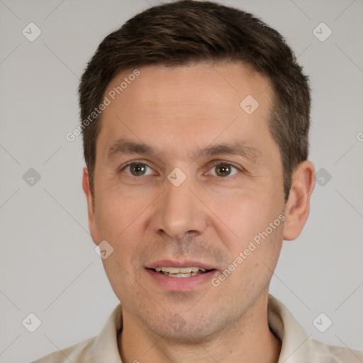 Joyful white adult male with short  brown hair and brown eyes