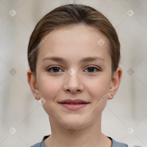 Joyful white child female with short  brown hair and brown eyes