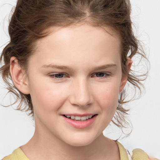 Joyful white child female with medium  brown hair and brown eyes