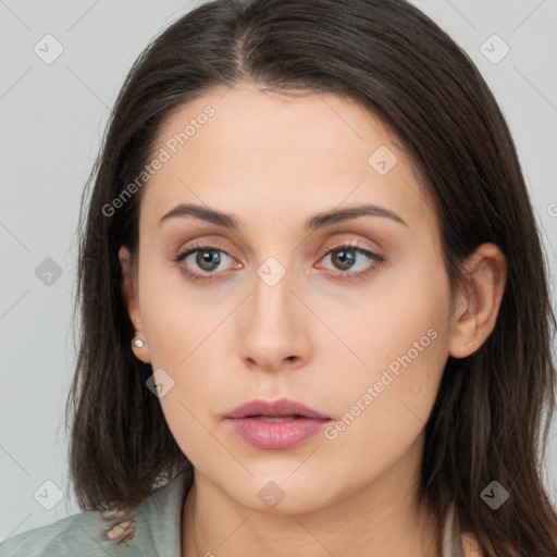 Neutral white young-adult female with long  brown hair and brown eyes