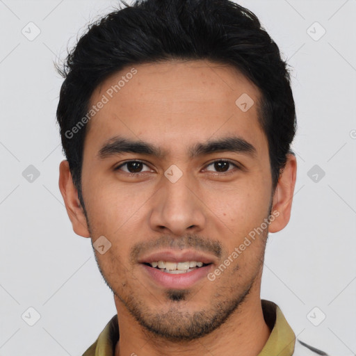 Joyful asian young-adult male with short  black hair and brown eyes