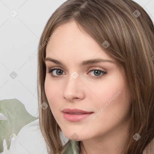 Neutral white young-adult female with long  brown hair and brown eyes